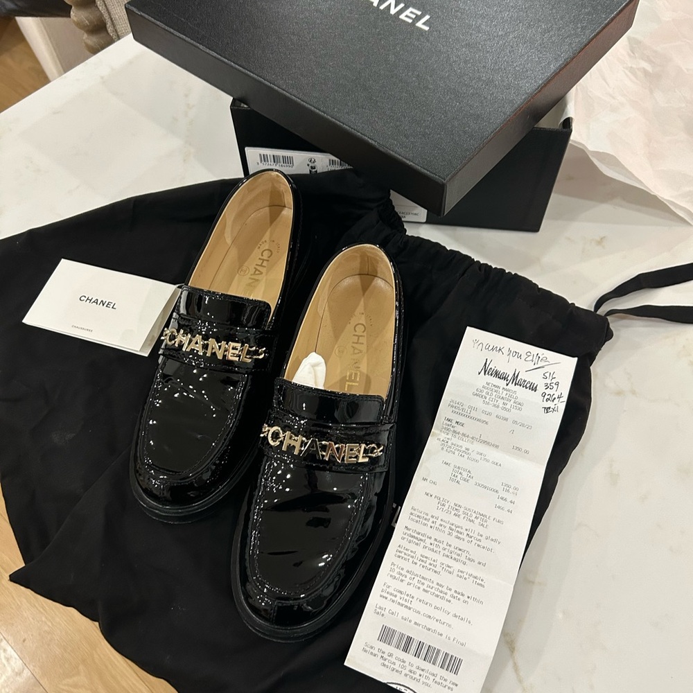 CHANEL Glossy Black Loafers with Gold Logo